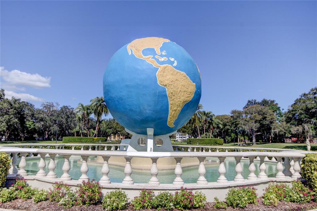 2170 Americus Boulevard North, Unit 64 Clearwater, FL 33763 - Photo 59 of 66 a view of swimming pool with outdoor seating and plants