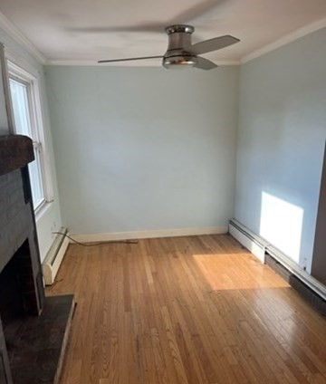 191 Lancaster Road Berlin, MA 01503 - Photo 8 of 22 a view of a room with wooden floor and a window