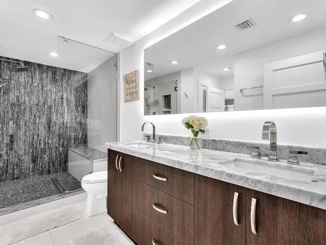 a aerial view of a house with a yard