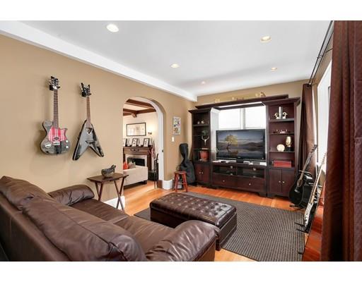 95 Welland Road Brookline, MA 02445 - Photo 13 of 28 a living room with furniture and a flat screen tv