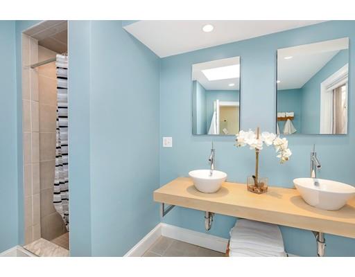 95 Welland Road Brookline, MA 02445 - Photo 19 of 28 a bathroom with a sink and a mirror