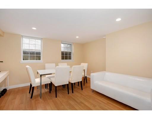 95 Welland Road Brookline, MA 02445 - Photo 21 of 28 a view of a dining room with furniture and wooden floor