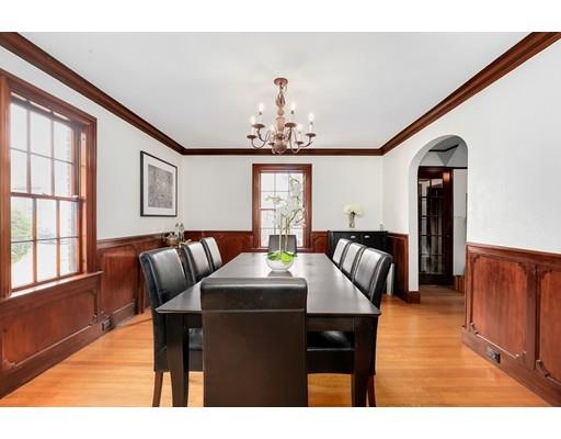 95 Welland Road Brookline, MA 02445 - Photo 6 of 28 a dining room with furniture a chandelier and window