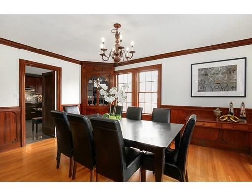 95 Welland Road Brookline, MA 02445 - Photo 7 of 28 a view of a dining room with furniture and chandelier