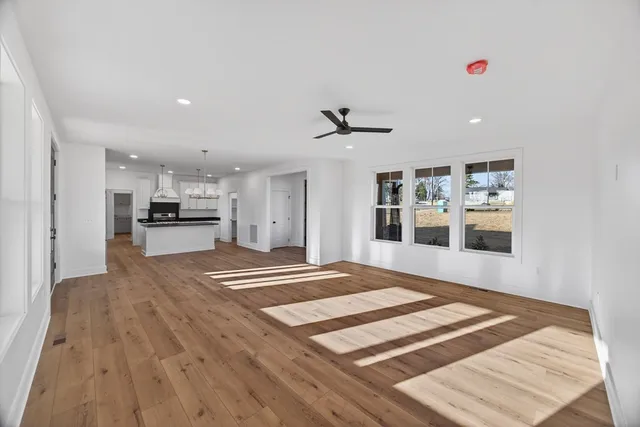 a view of kitchen with wooden floor