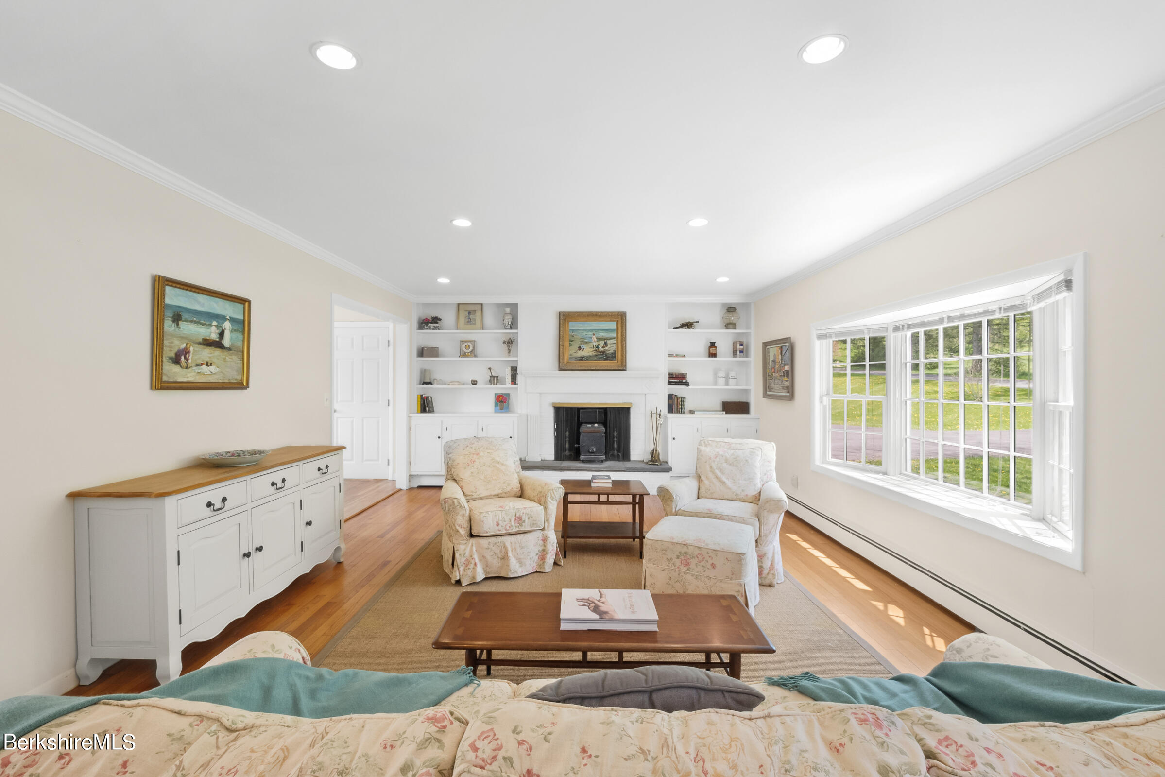79 View Drive Richmond, MA 01201 - Photo 12 of 34 a living room with fireplace furniture and a floor to ceiling window