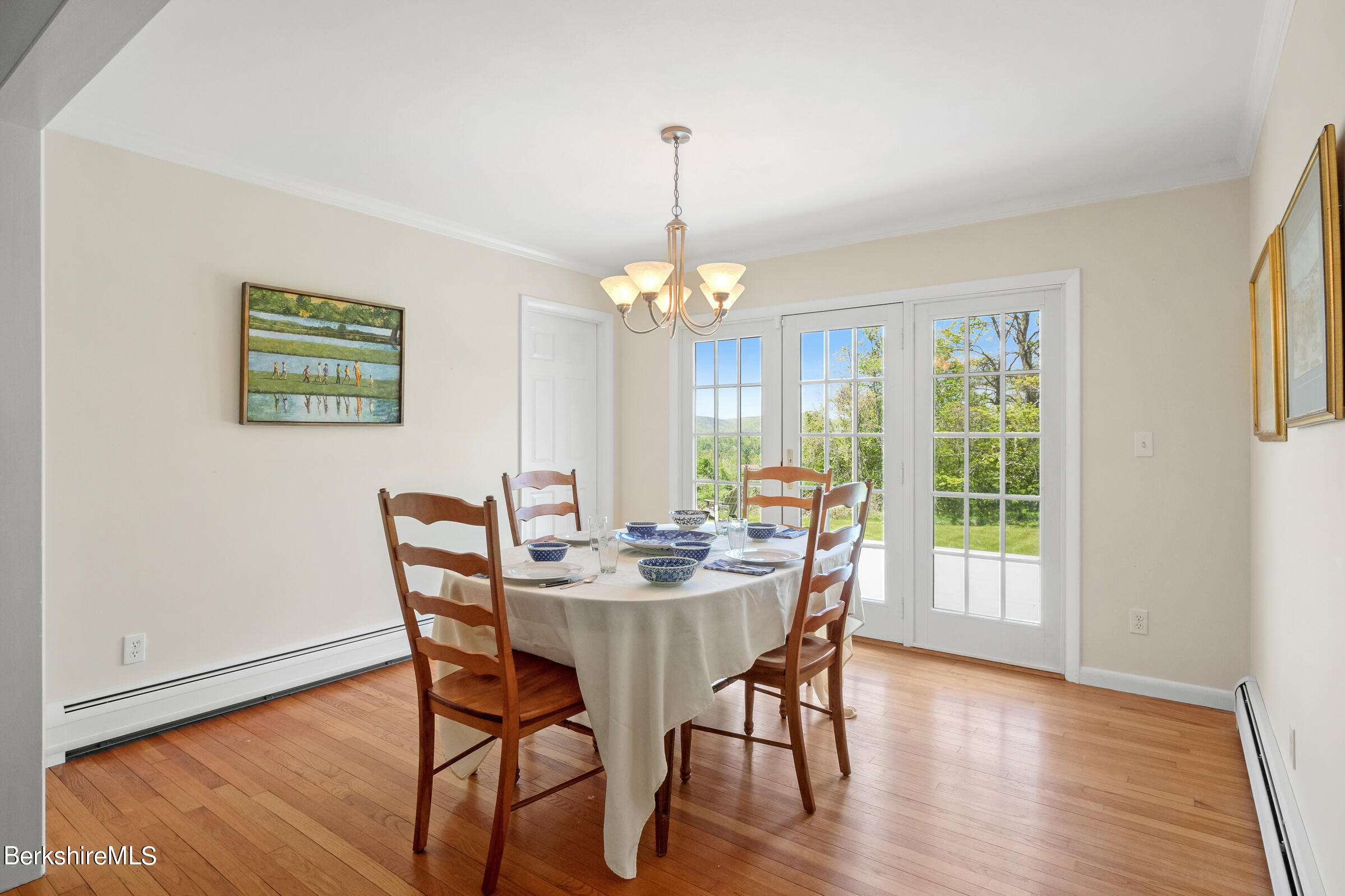 79 View Drive Richmond, MA 01201 - Photo 14 of 34 a dining room with furniture a chandelier and wooden floor