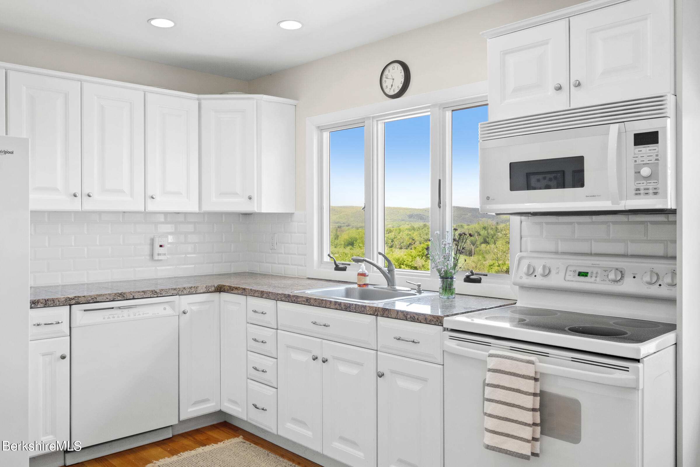 79 View Drive Richmond, MA 01201 - Photo 17 of 34 a kitchen with appliances cabinets and a sink