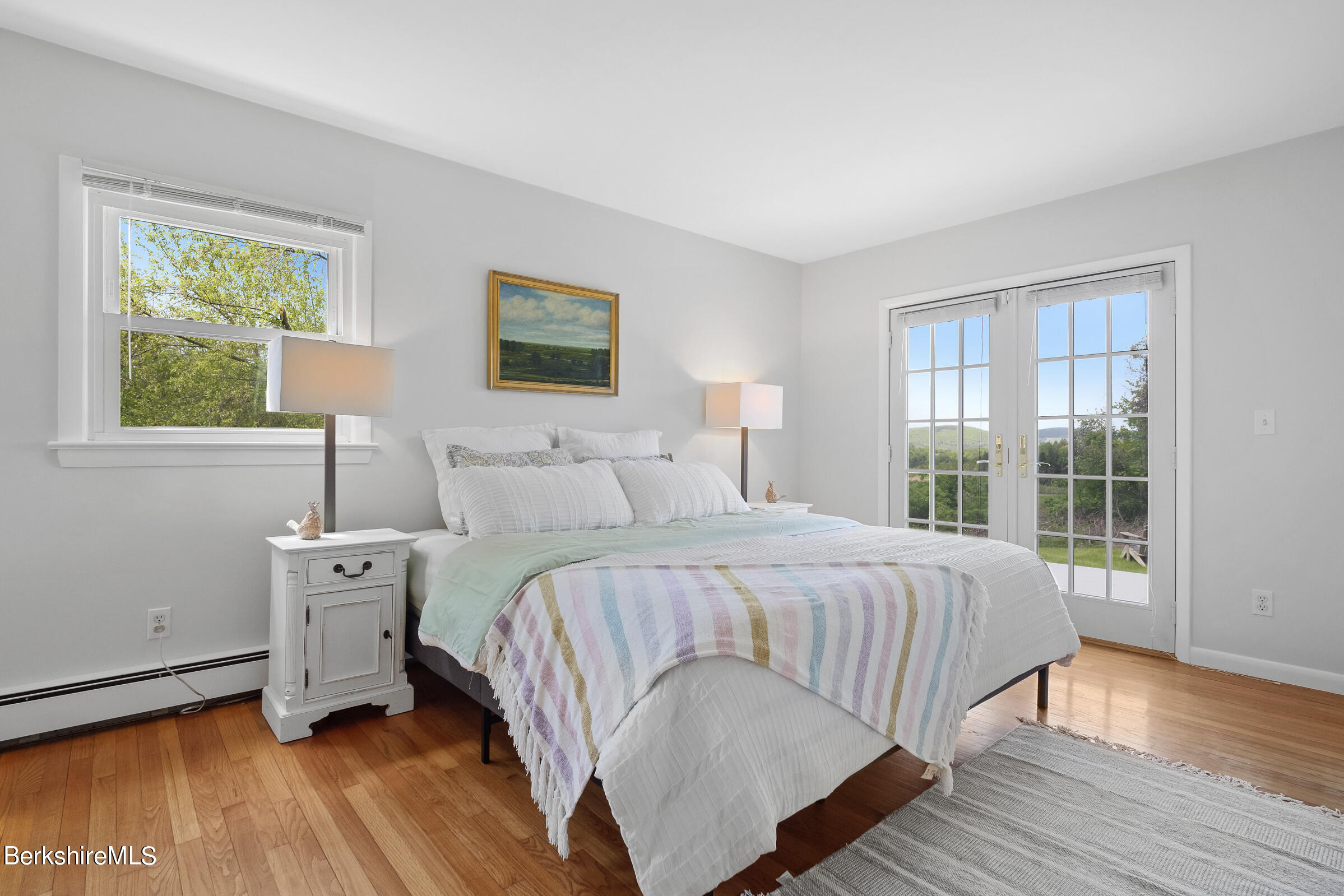 79 View Drive Richmond, MA 01201 - Photo 22 of 34 a bedroom with a bed and wooden floor