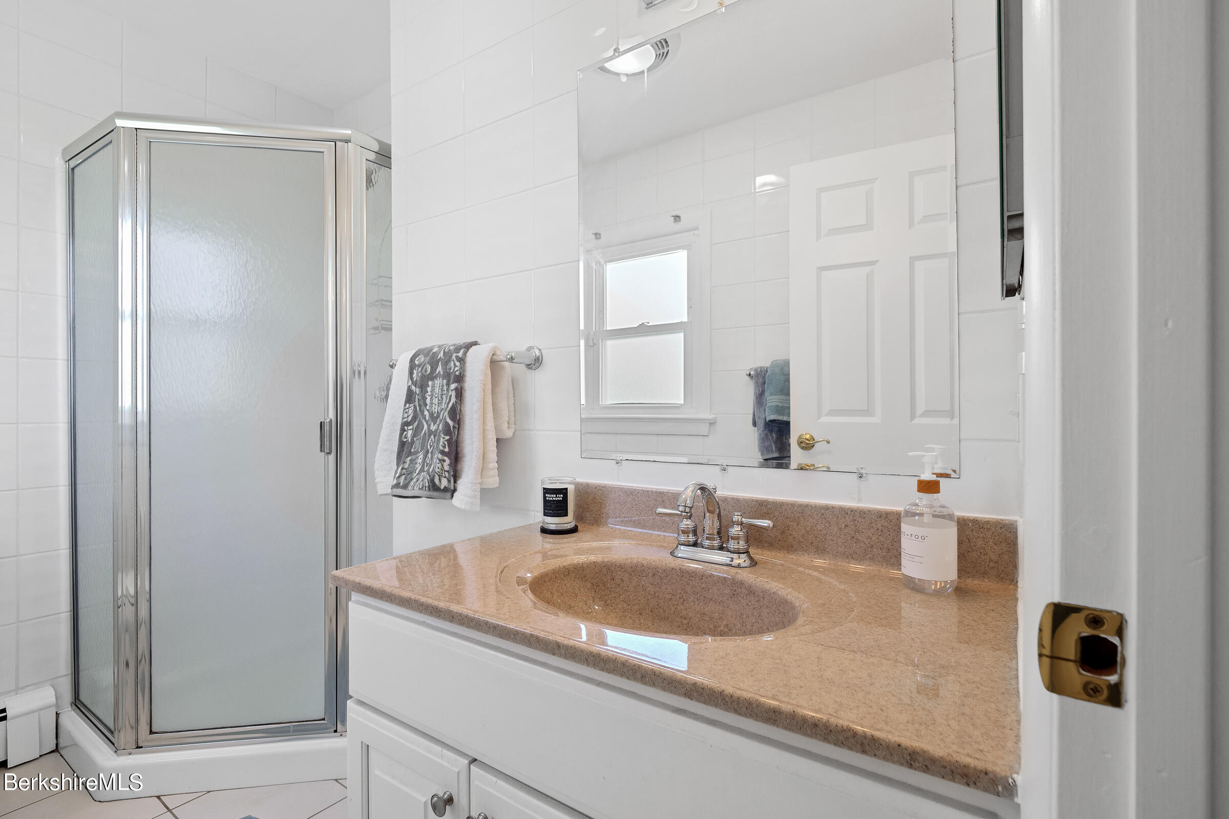 79 View Drive Richmond, MA 01201 - Photo 24 of 34 a bathroom with a granite countertop sink and a mirror