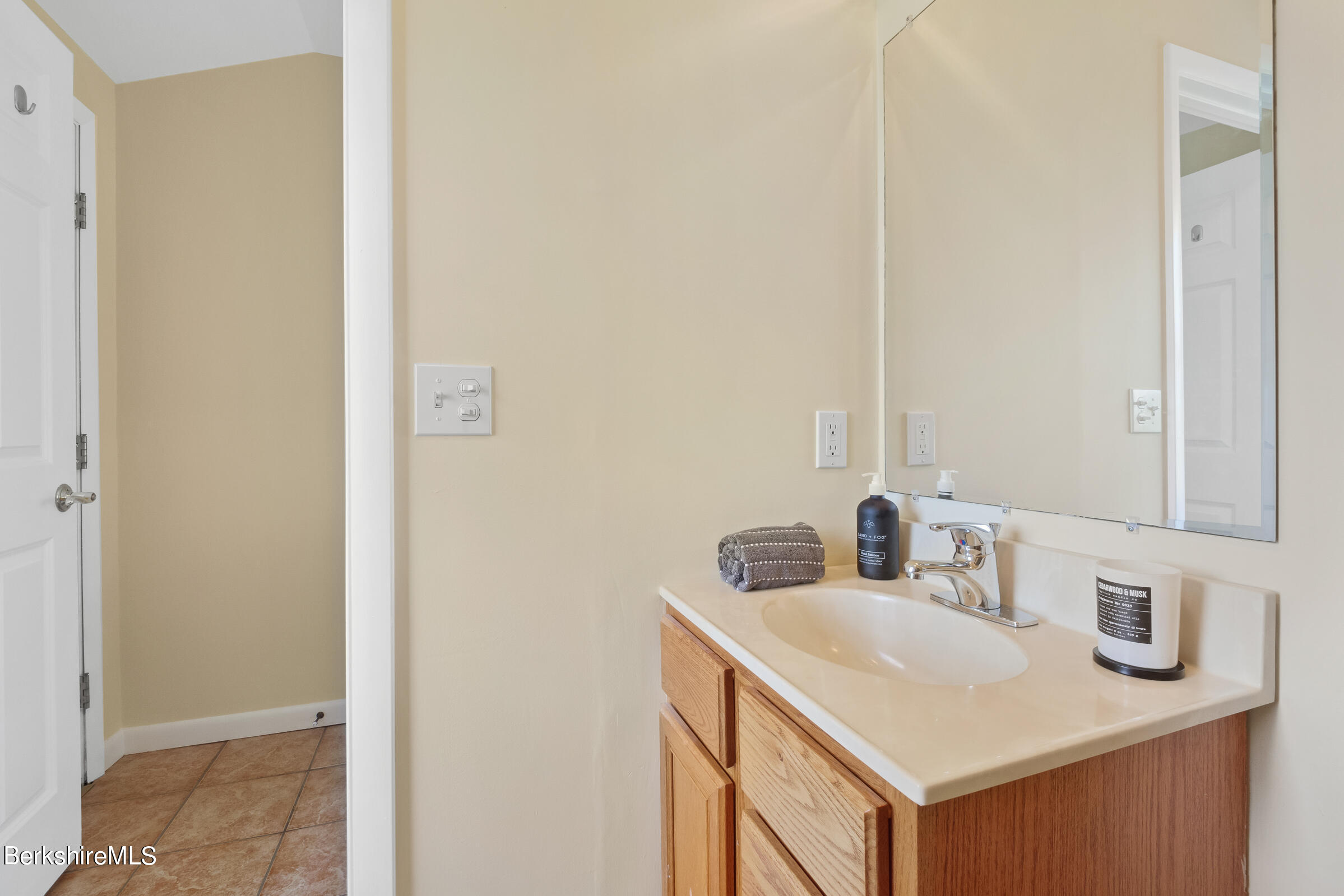 79 View Drive Richmond, MA 01201 - Photo 30 of 34 a bathroom with a sink and a mirror
