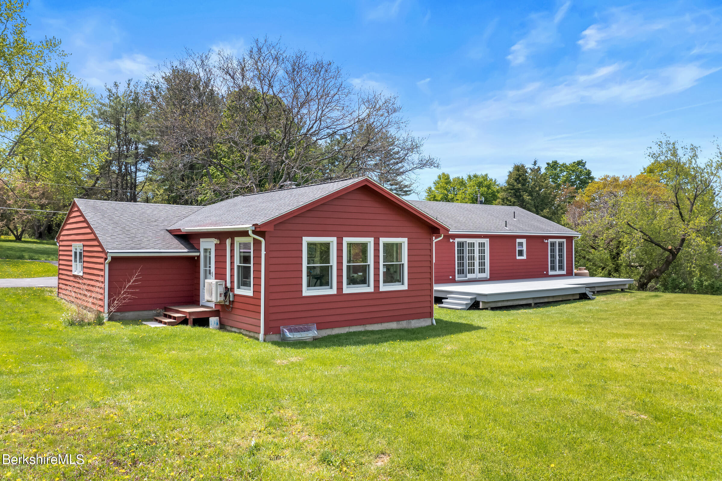 79 View Drive Richmond, MA 01201 - Photo 32 of 34 a view of a house with a yard potted plants and large tree