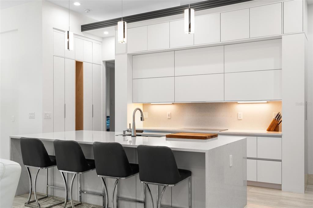 380 Cowry Road Venice, FL 34293 - Photo 12 of 44 a kitchen with a sink cabinets and window