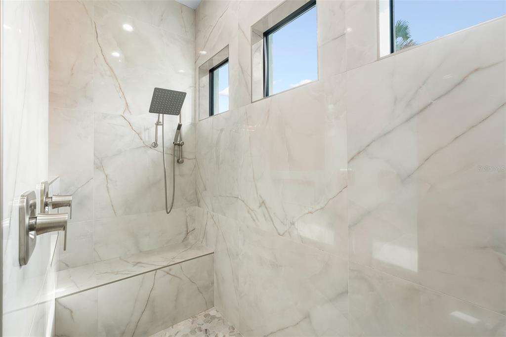 380 Cowry Road Venice, FL 34293 - Photo 24 of 44 a bathroom with a shower