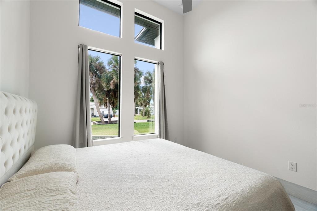 380 Cowry Road Venice, FL 34293 - Photo 35 of 44 a bedroom with a bed and a window
