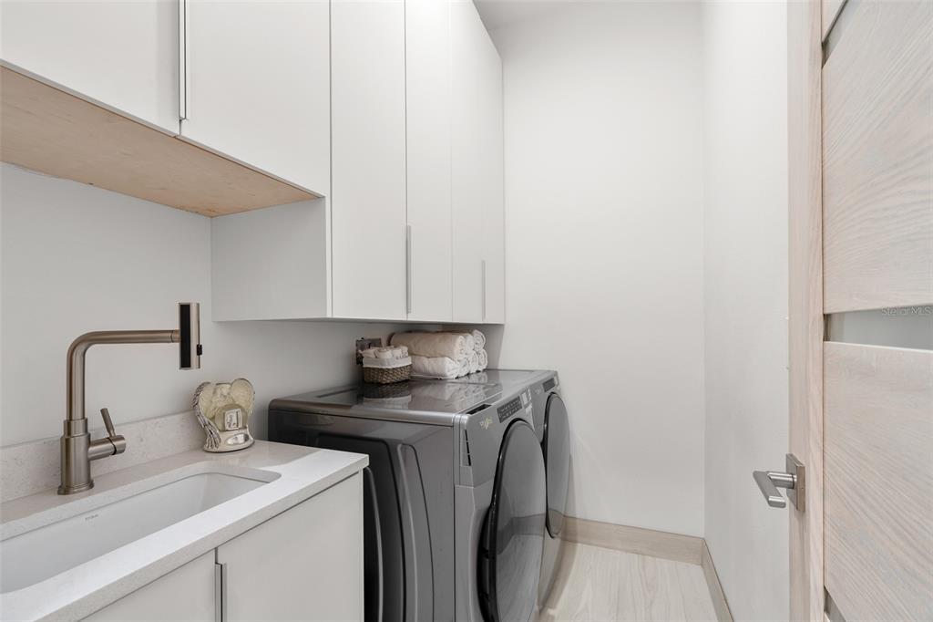 380 Cowry Road Venice, FL 34293 - Photo 36 of 44 a view of a kitchen with sink and cabinets