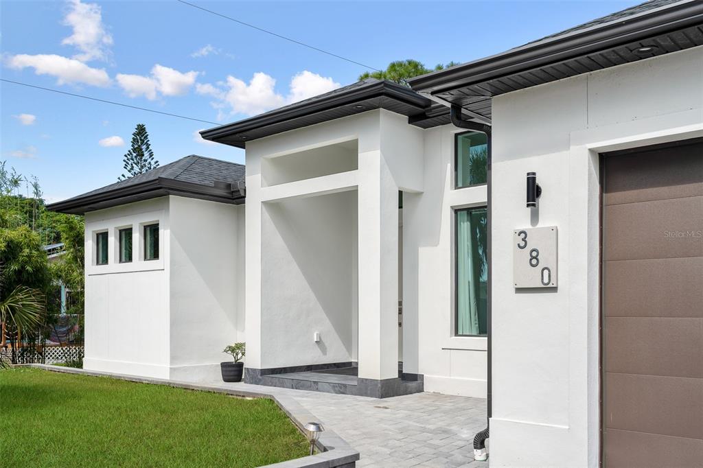 380 Cowry Road Venice, FL 34293 - Photo 6 of 44 a view of a house with a yard