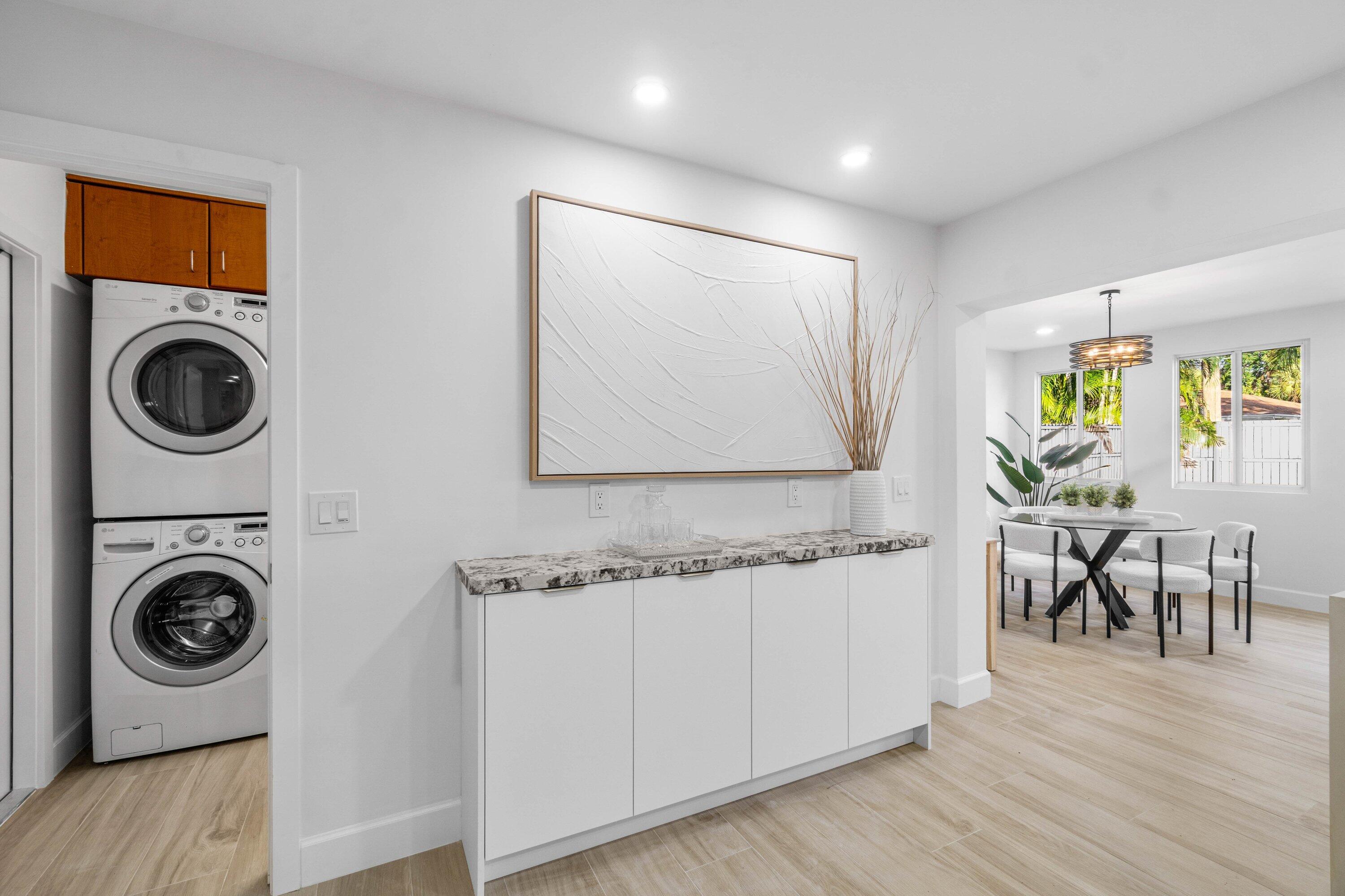2634 Southwest 5th Street Boynton Beach, FL 33435 - Photo 13 of 57 a view of a living room washer and dryer