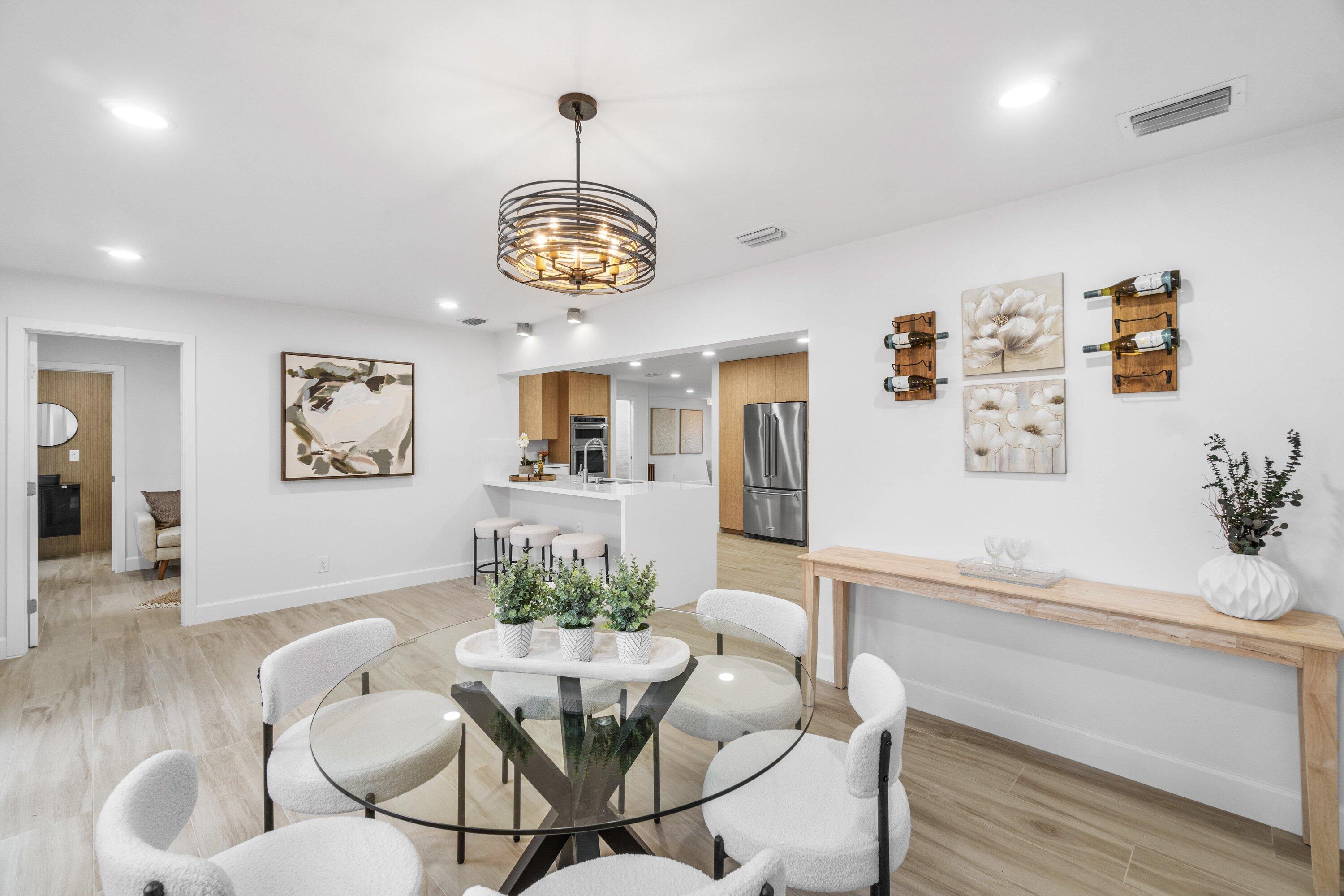 2634 Southwest 5th Street Boynton Beach, FL 33435 - Photo 16 of 57 a view of a dining room with furniture