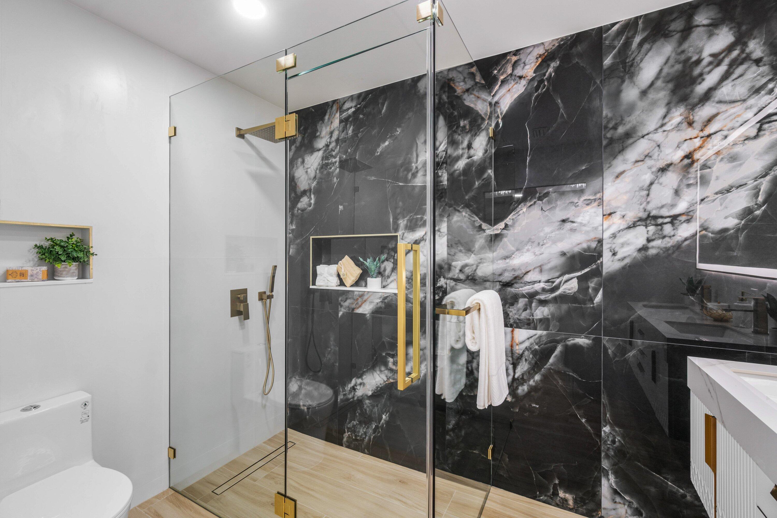 2634 Southwest 5th Street Boynton Beach, FL 33435 - Photo 23 of 57 a bathroom with a shower and toilet