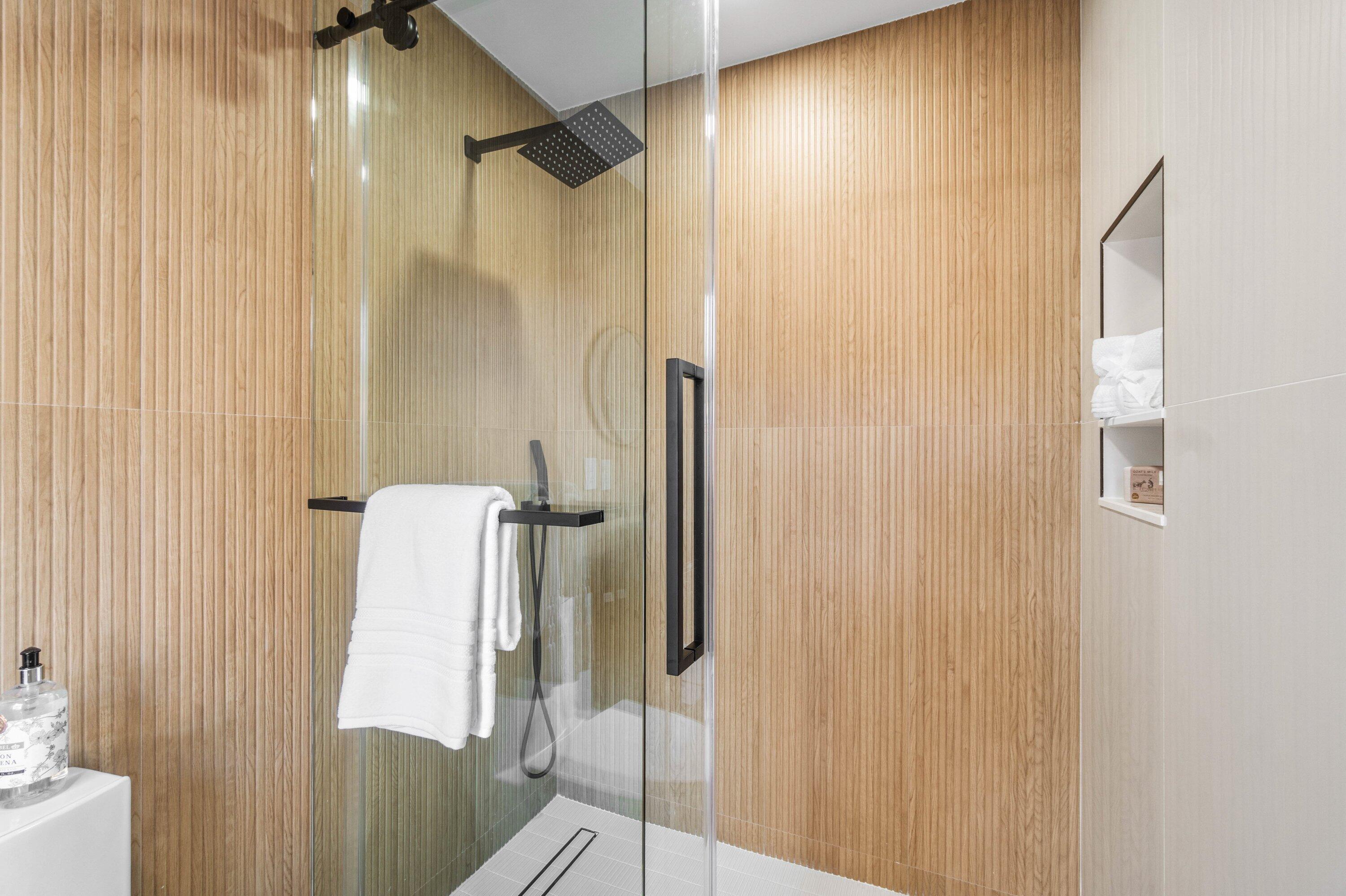 2634 Southwest 5th Street Boynton Beach, FL 33435 - Photo 32 of 57 a bathroom with a shower and a tub