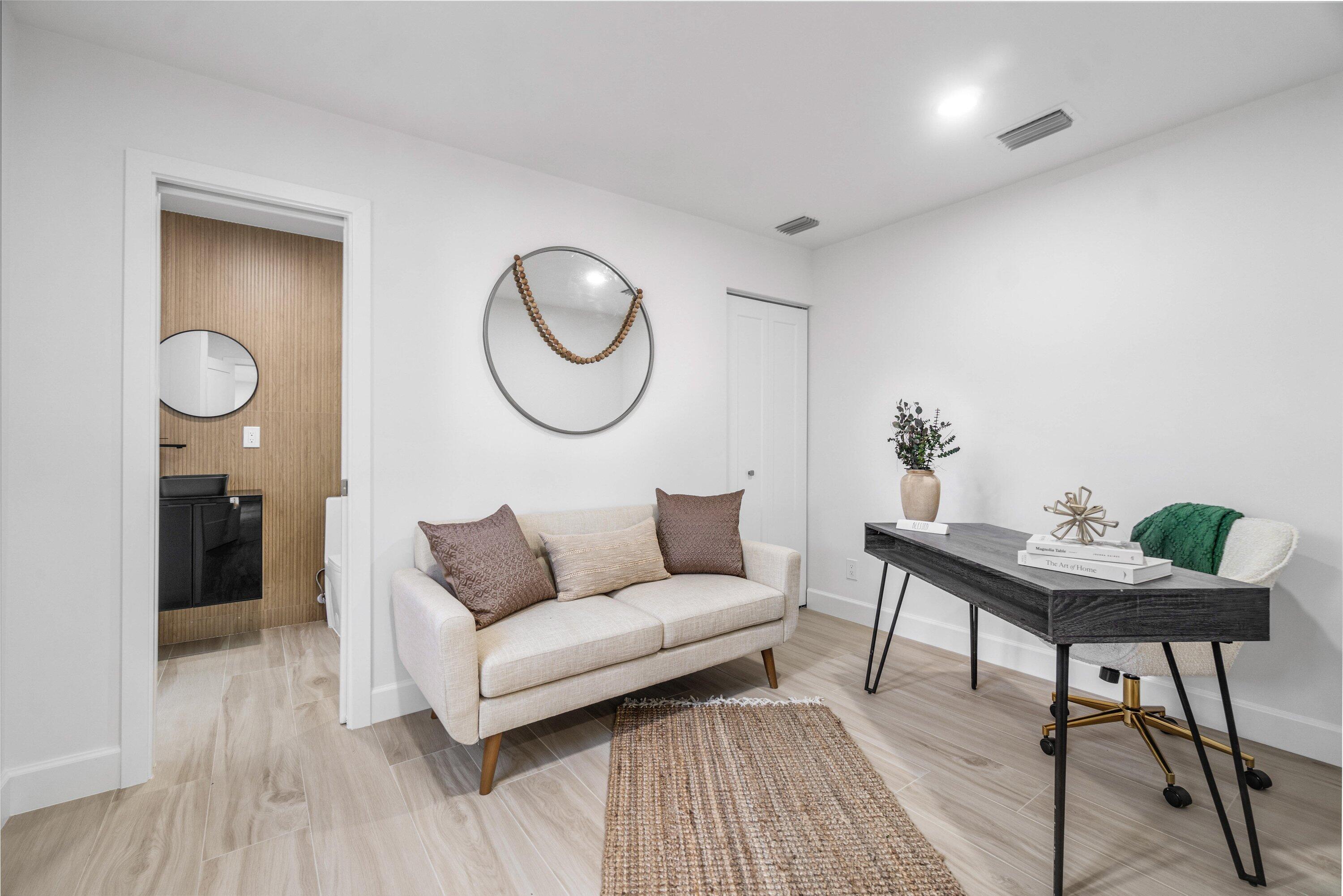 2634 Southwest 5th Street Boynton Beach, FL 33435 - Photo 34 of 57 a living room with furniture and wooden floor