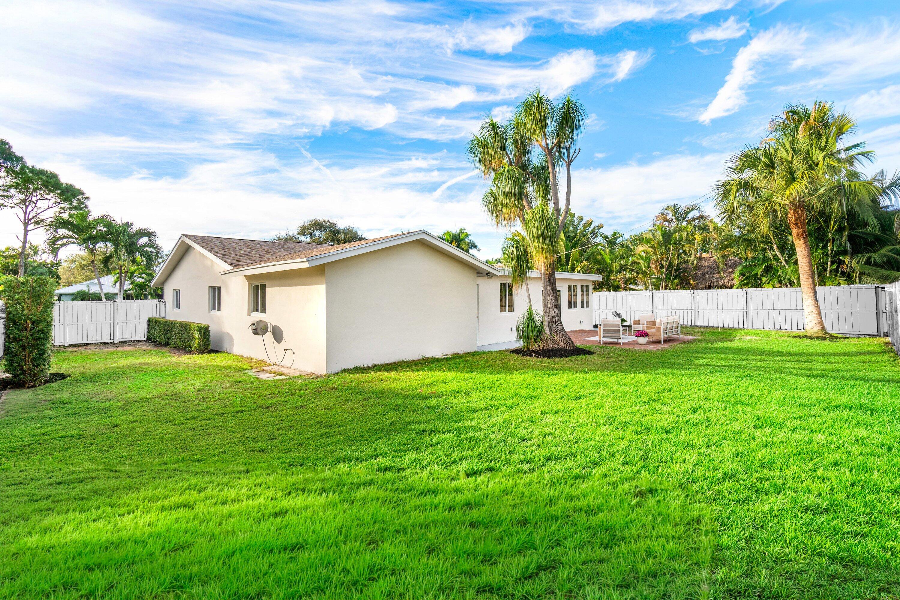 2634 Southwest 5th Street Boynton Beach, FL 33435 - Photo 46 of 57 a view of a backyard with a garden