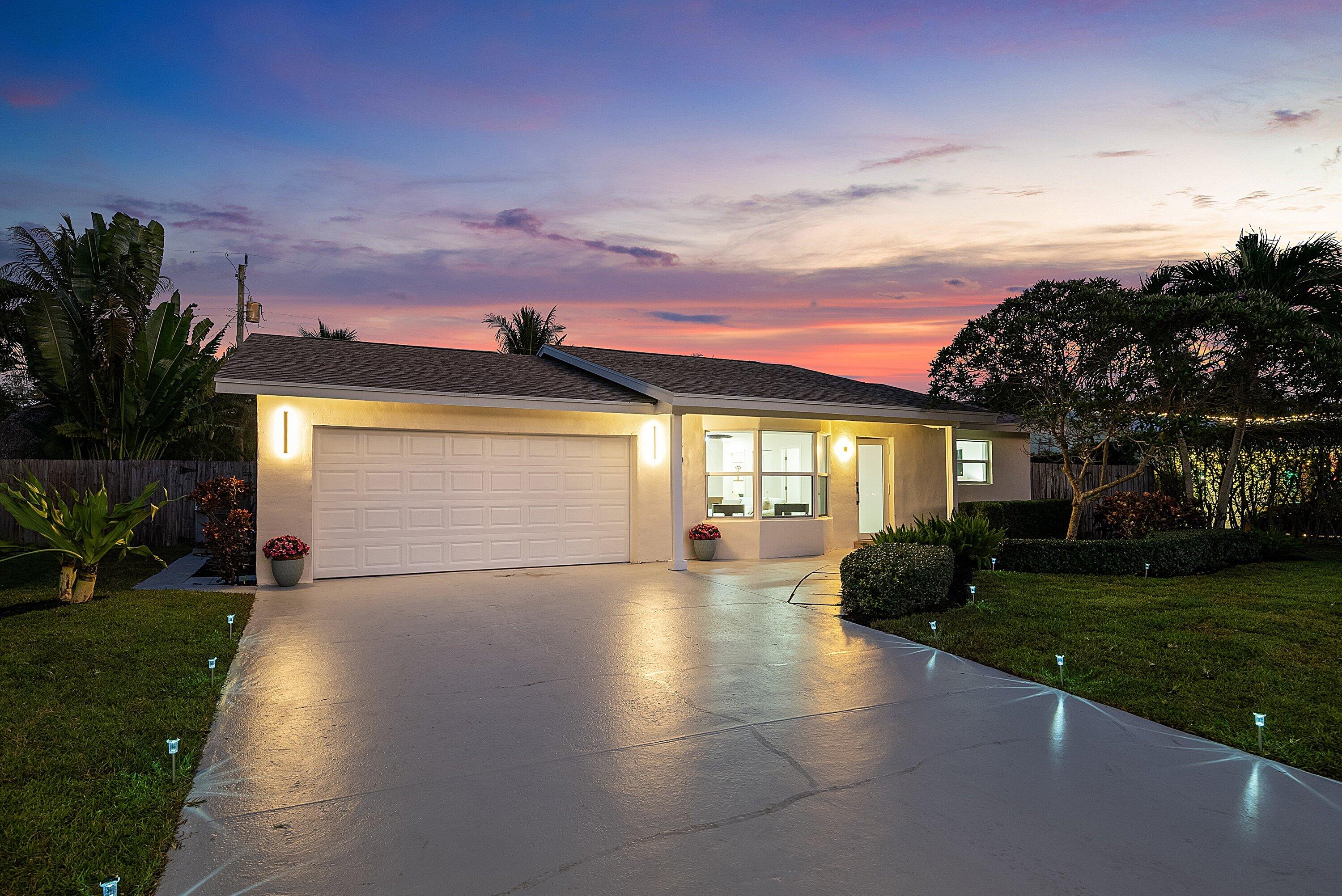2634 Southwest 5th Street Boynton Beach, FL 33435 - Photo 55 of 57 a view of a house with a yard