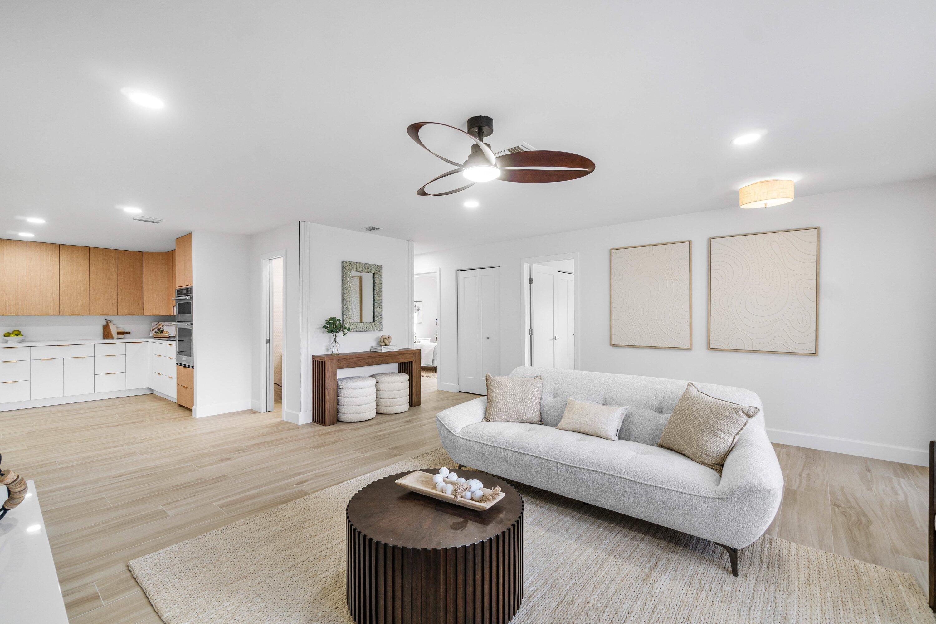 2634 Southwest 5th Street Boynton Beach, FL 33435 - Photo 7 of 57 a living room with furniture and a table