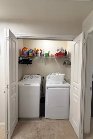 a utility room with dryer and washer
