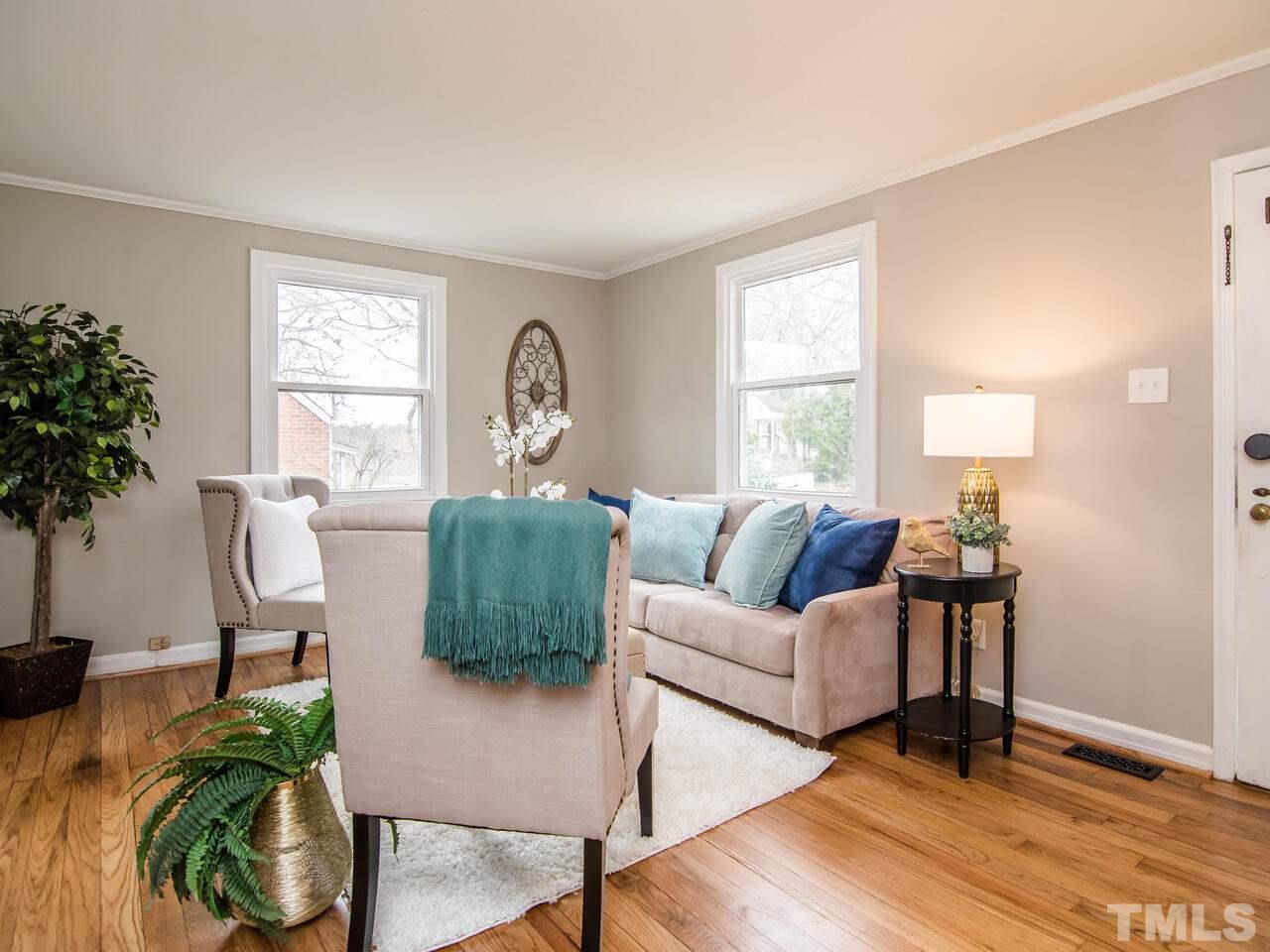 1706 Patton Road Raleigh, NC 27608 - Photo 3 of 22 a living room with furniture potted plant and a window