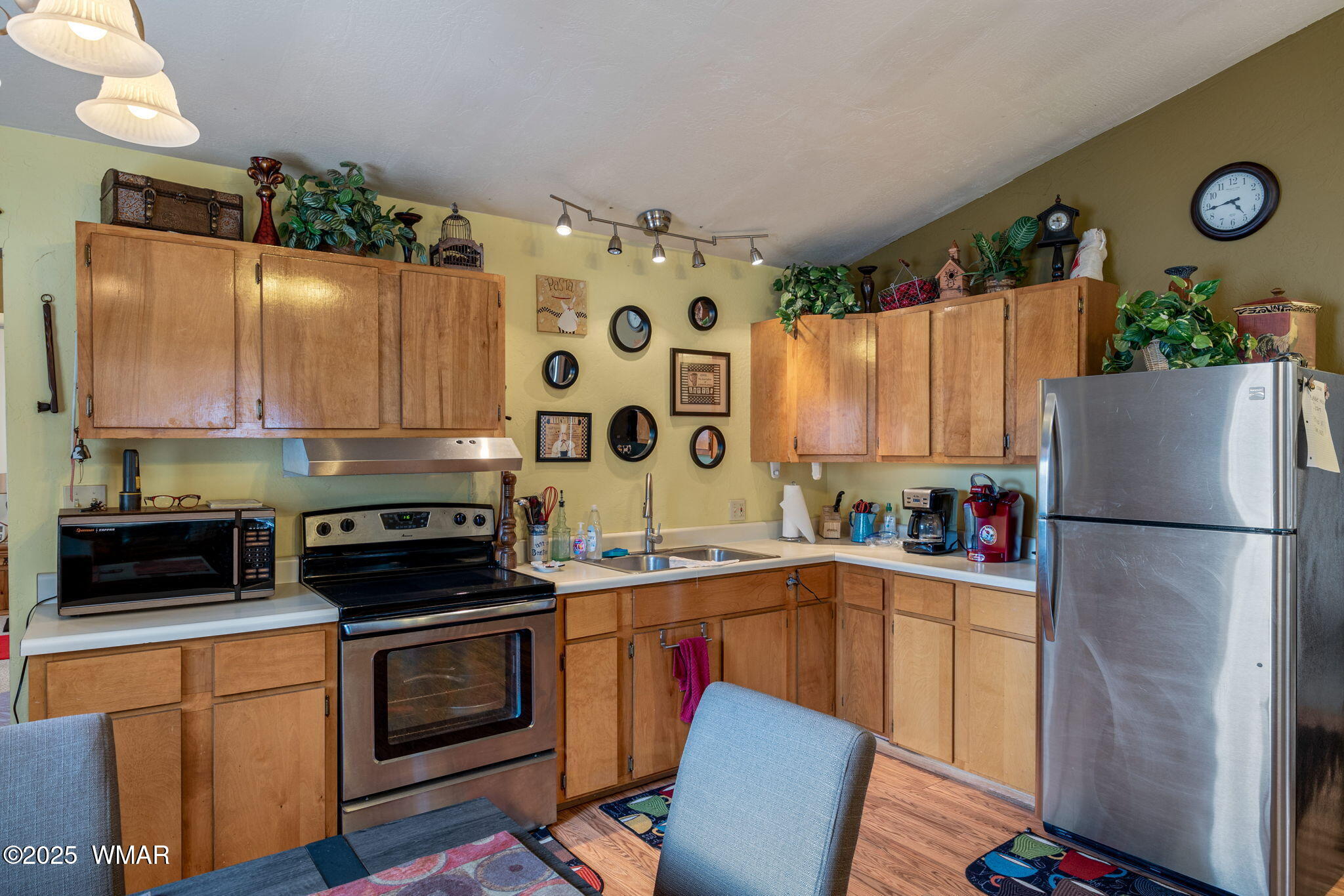 2051 Lumber Valley Road Overgaard, AZ 85933 - Photo 10 of 30 a kitchen with a sink a stove and refrigerator
