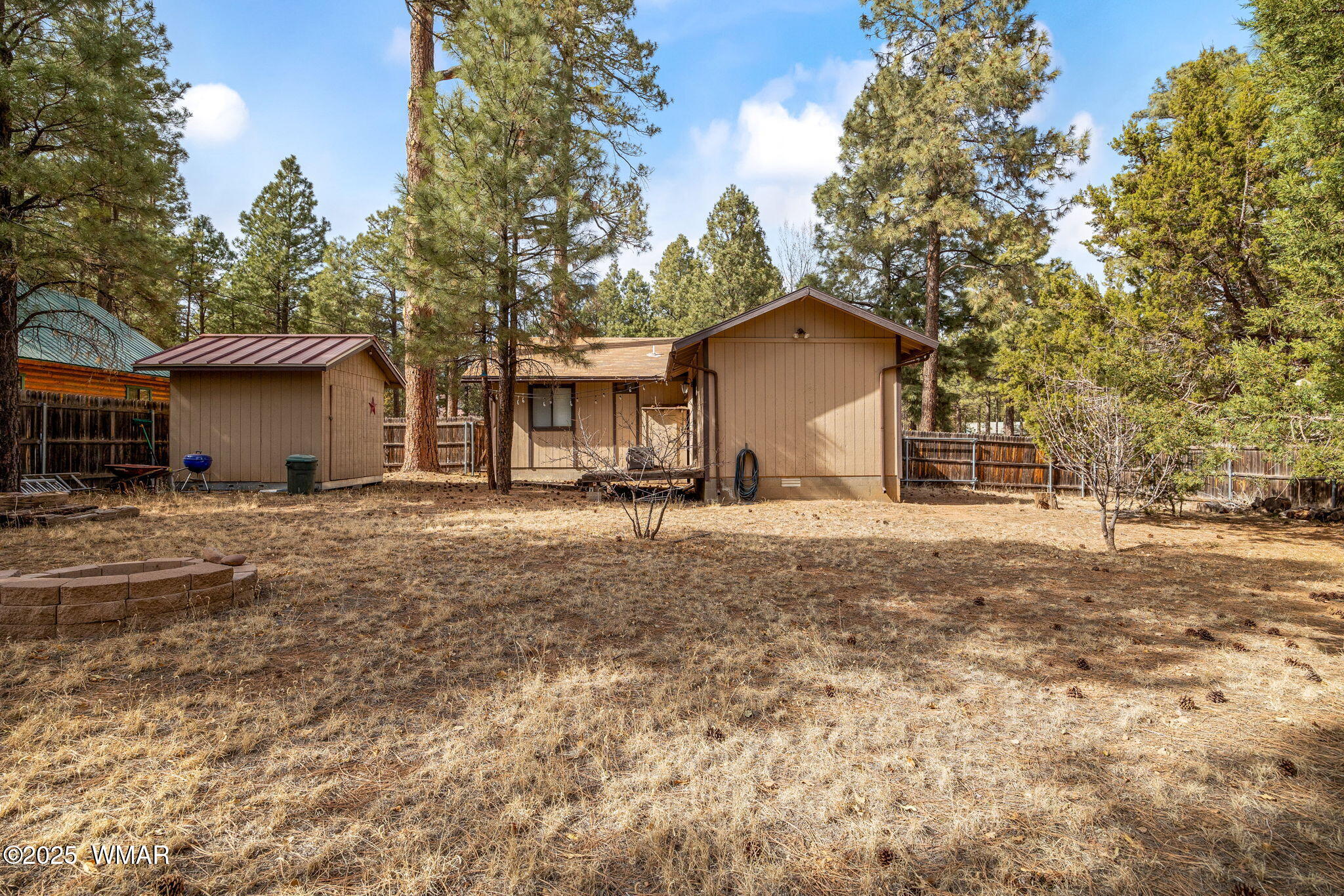 2051 Lumber Valley Road Overgaard, AZ 85933 - Photo 19 of 30 a view of a house with a yard