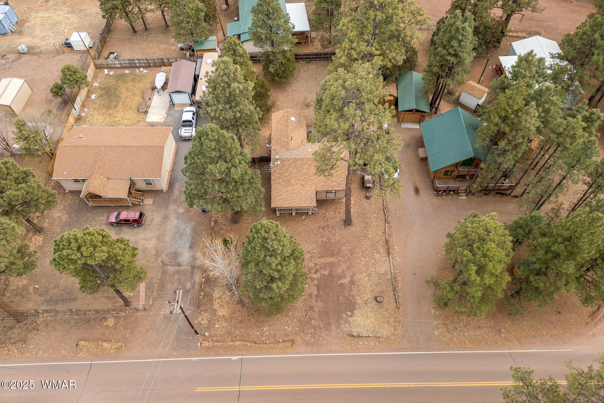 2051 Lumber Valley Road Overgaard, AZ 85933 - Photo 26 of 30 an aerial view of a house with a yard and large tree
