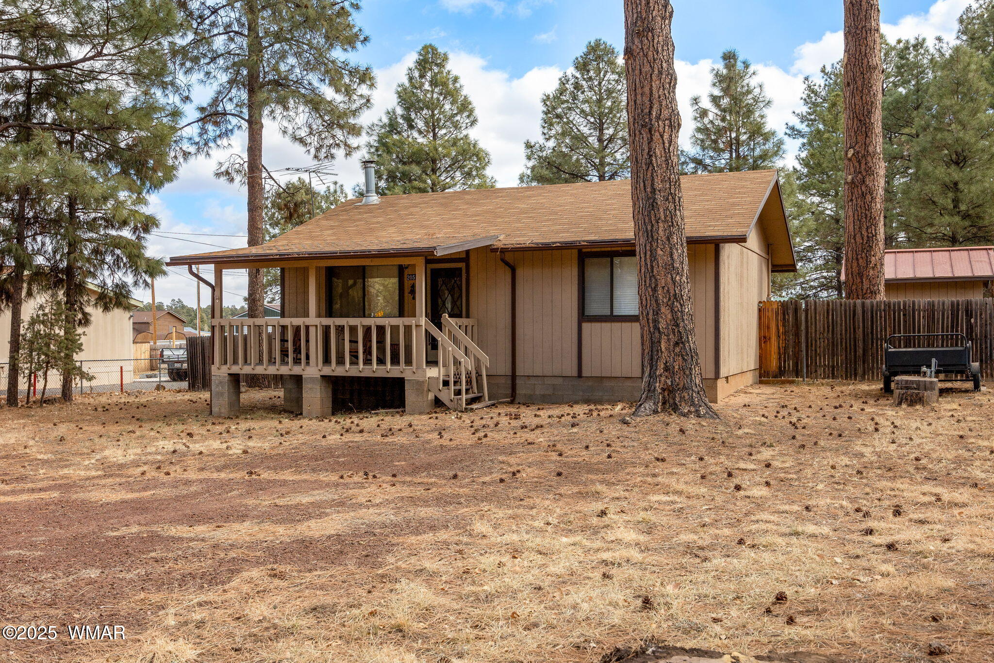 2051 Lumber Valley Road Overgaard, AZ 85933 - Photo 2 of 30 a view of a house with a yard