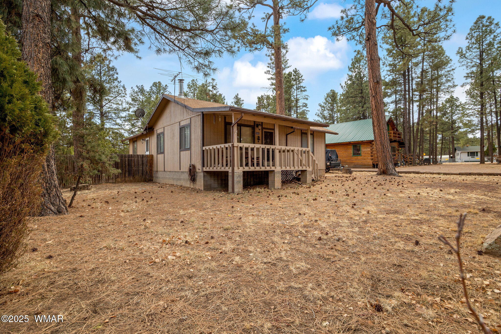 2051 Lumber Valley Road Overgaard, AZ 85933 - Photo 3 of 30 front view of a house with a yard