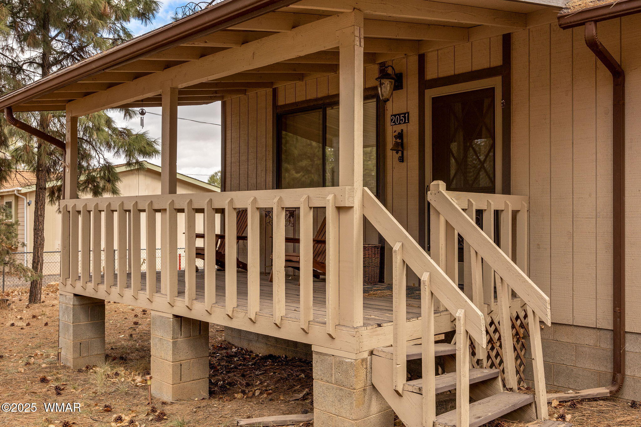 2051 Lumber Valley Road Overgaard, AZ 85933 - Photo 4 of 30 a view of wooden house with a large windows