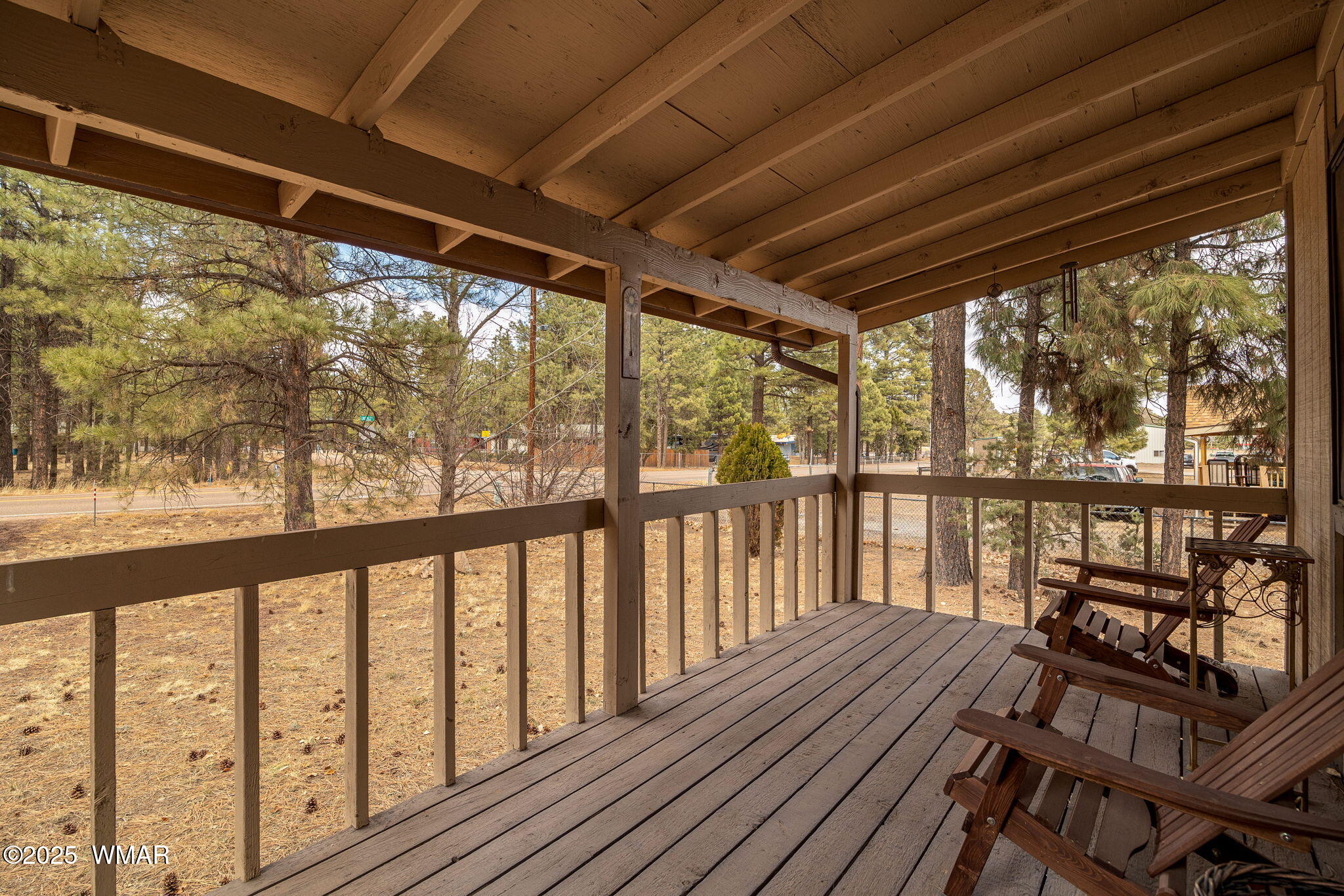 2051 Lumber Valley Road Overgaard, AZ 85933 - Photo 5 of 30 a view of a balcony with wooden floor