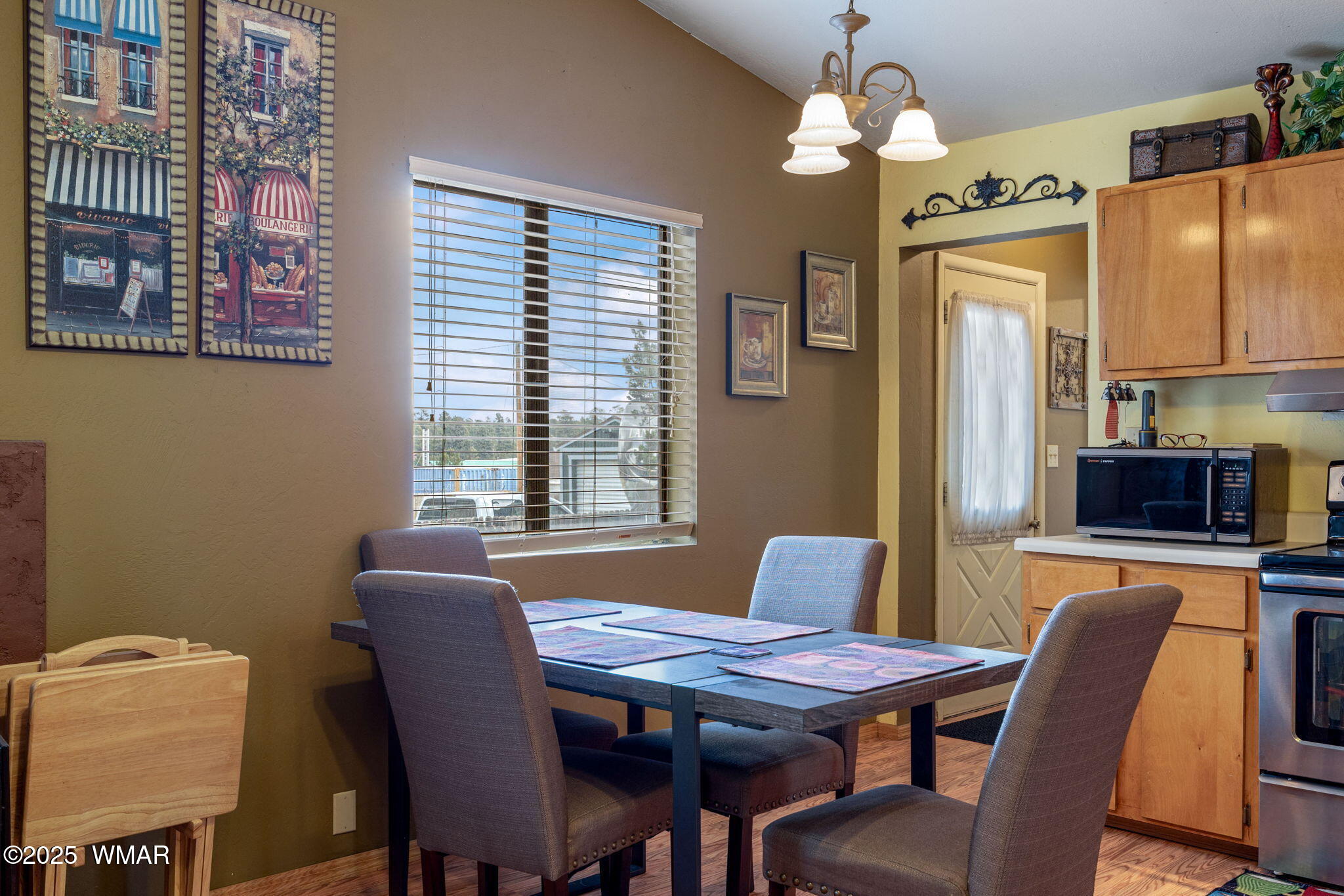 2051 Lumber Valley Road Overgaard, AZ 85933 - Photo 9 of 30 a view of a dining room with furniture window and wooden floor