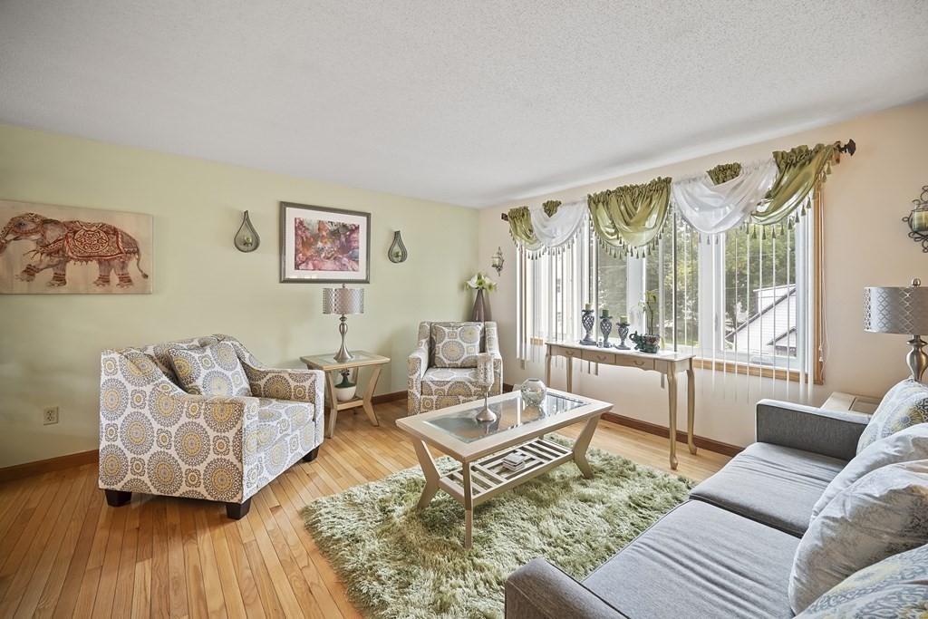 44 Judson Street Fall River, MA 02721 - Photo 12 of 31 a living room with furniture and a large window