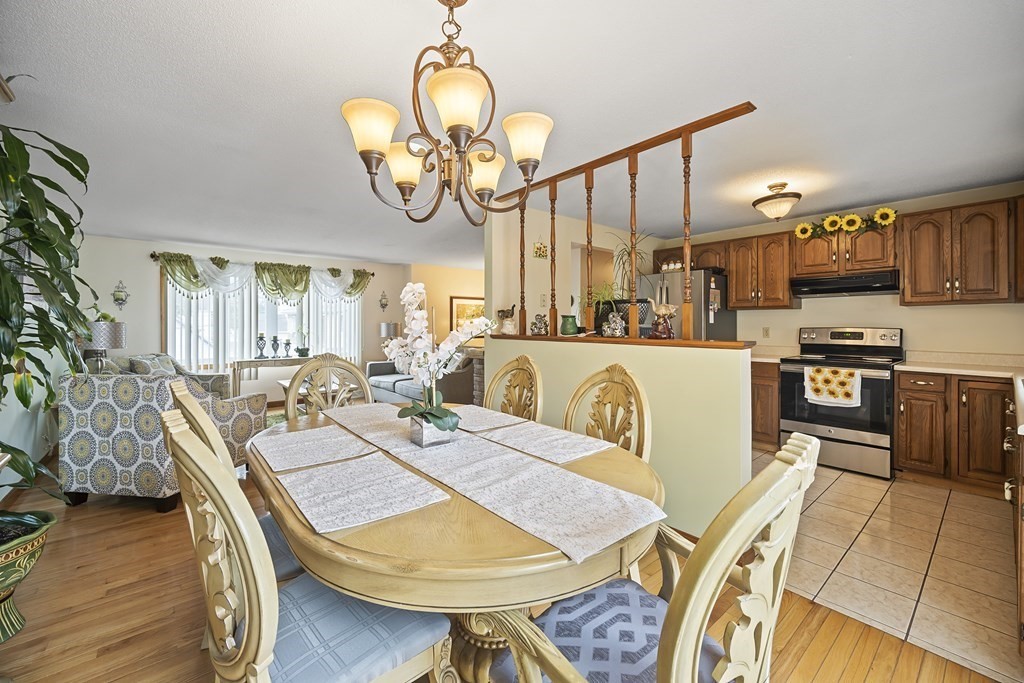 44 Judson Street Fall River, MA 02721 - Photo 14 of 31 a view of a dining room with furniture and a chandelier