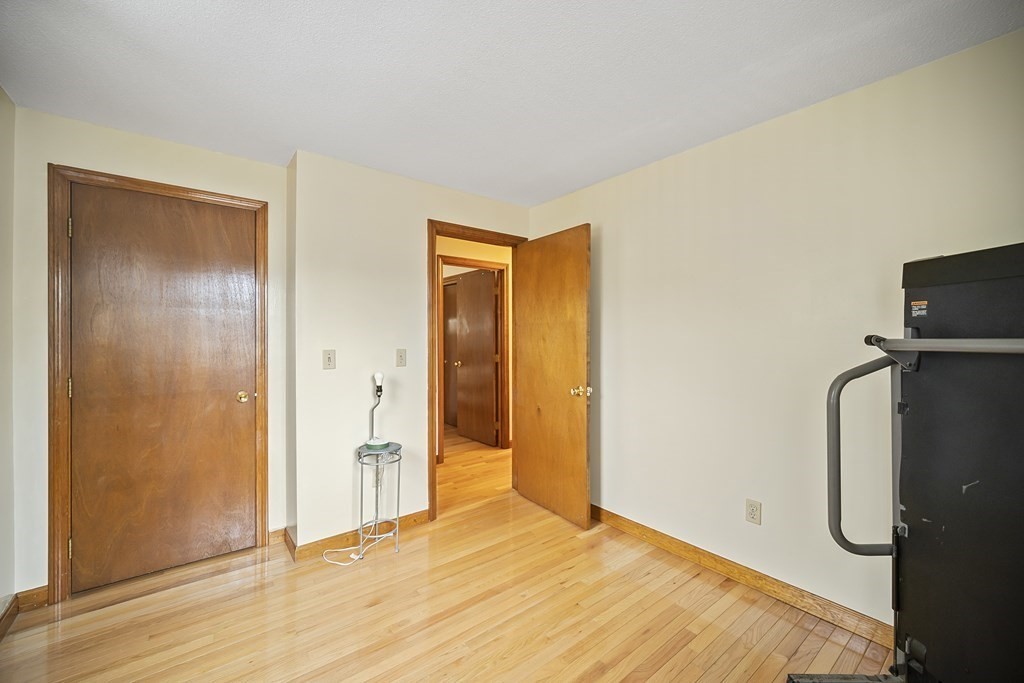 44 Judson Street Fall River, MA 02721 - Photo 19 of 31 a view of a room with wooden floor and bathroom