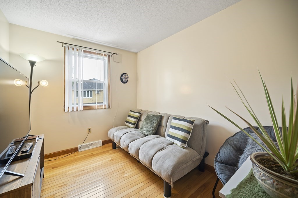 44 Judson Street Fall River, MA 02721 - Photo 20 of 31 a living room with furniture and a window