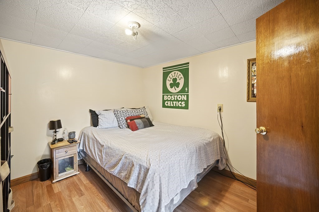 44 Judson Street Fall River, MA 02721 - Photo 28 of 31 a bedroom with a bed and a desk