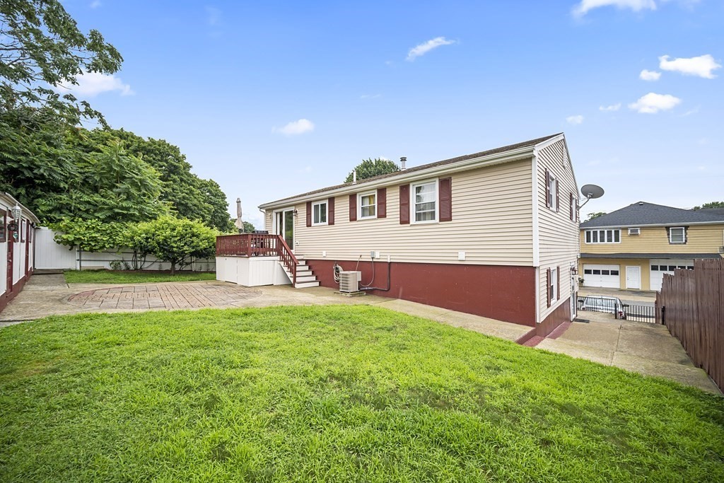 44 Judson Street Fall River, MA 02721 - Photo 3 of 31 a front view of house with yard and seating area