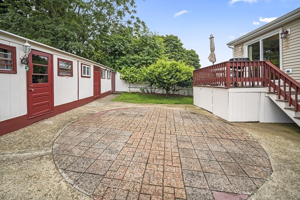 44 Judson Street Fall River, MA 02721 - Photo 5 of 31 a front view of a house with garden