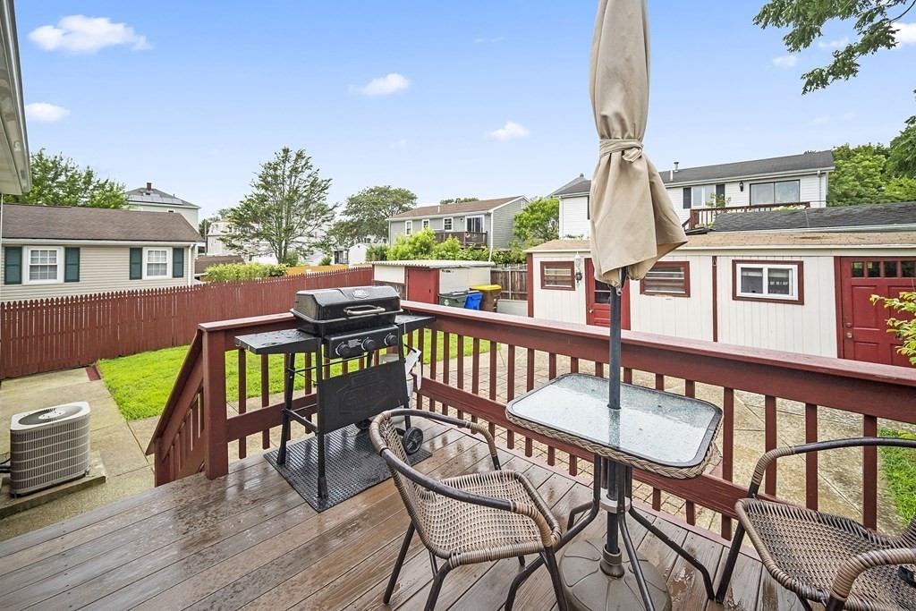 44 Judson Street Fall River, MA 02721 - Photo 6 of 31 a view of a chair and table in the balcony