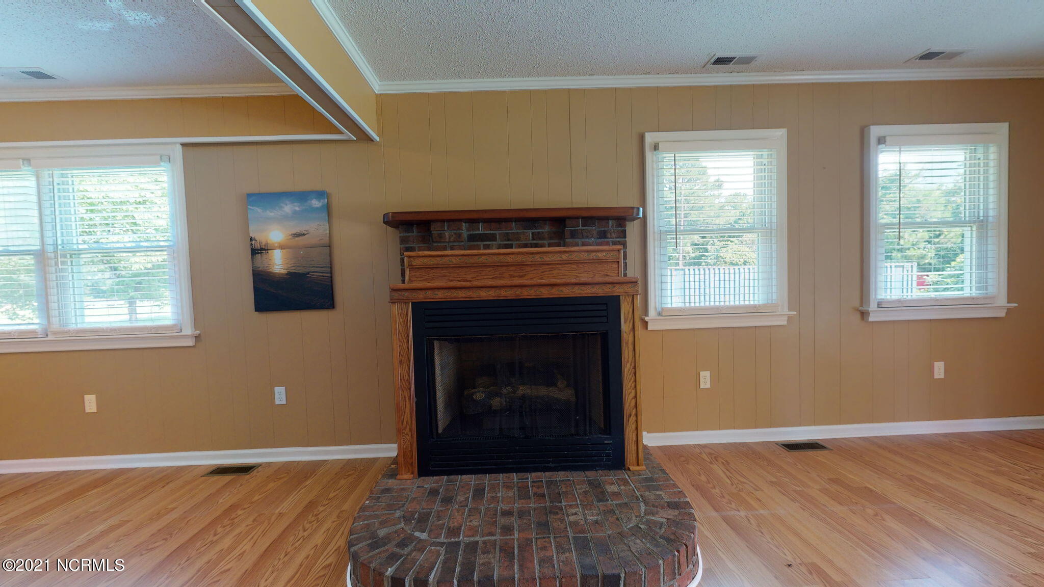 2272 Whichards Beach Road Chocowinity, NC 27817 - Photo 20 of 32 Fireplace separates dining and den