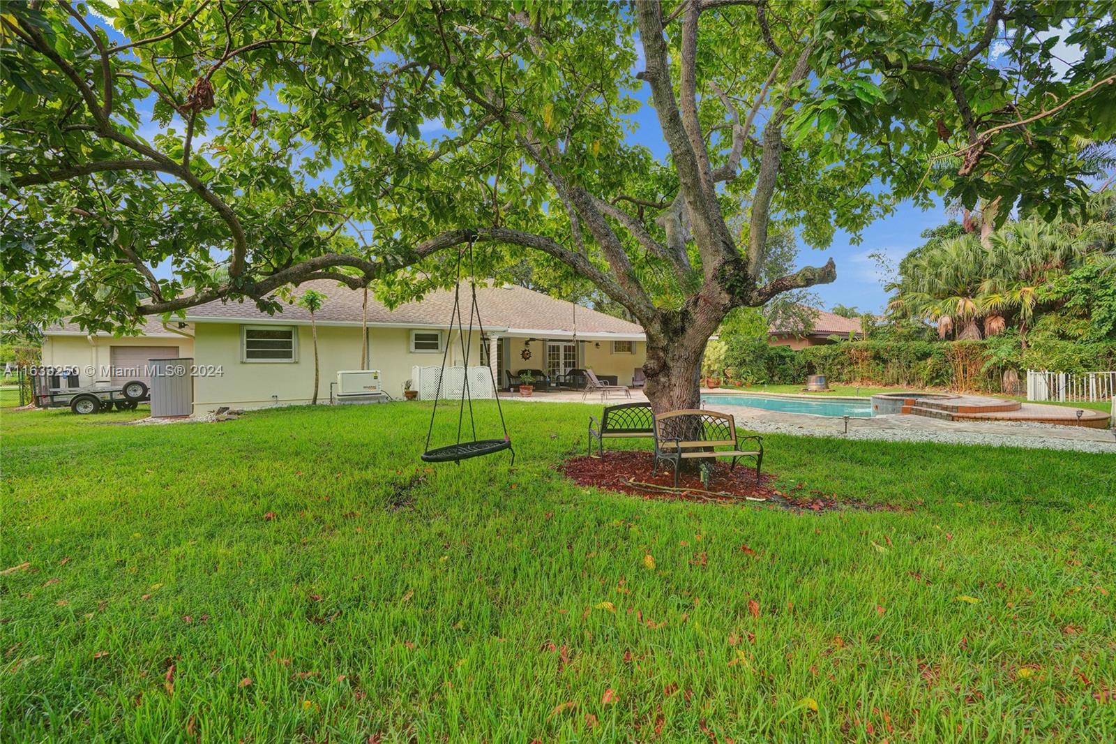 16630 Southwest 62nd Street Southwest Ranches, FL 33331 - Photo 24 of 33 a view of a house with a yard