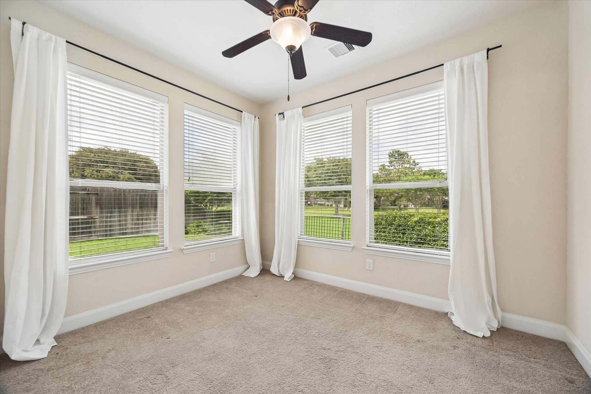 2214 Wembley Way Rosenberg, TX 77471 - Photo 25 of 35 Room featuring neutral-toned carpet flooring and light-colored walls